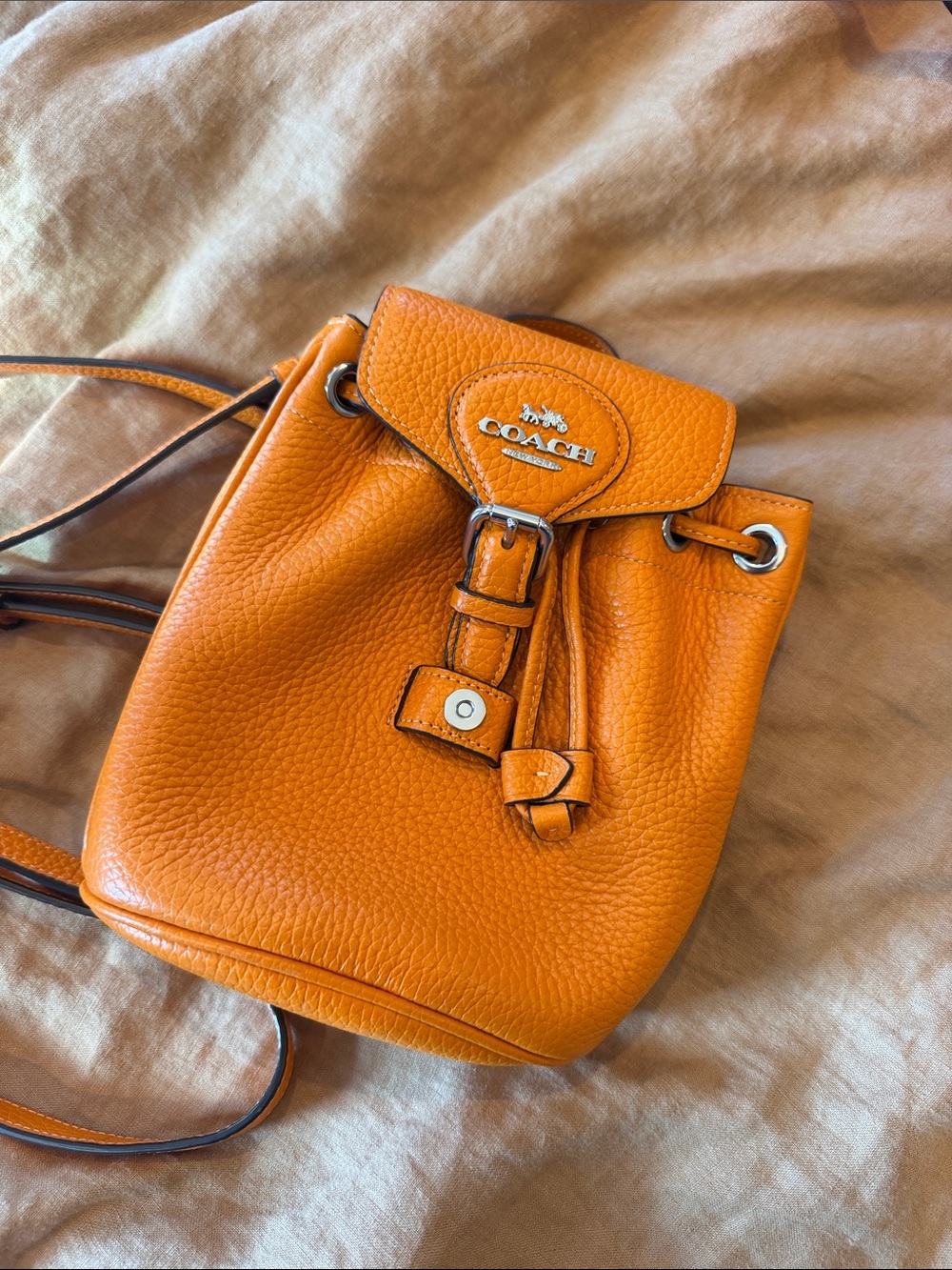 Coach Pebbled Leather Mini backpack convertible Crossbody in Bright Orange